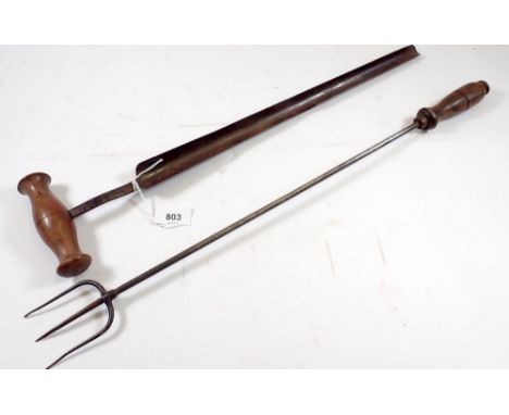 An antique cheese tester, 52cm and an iron toasting fork 