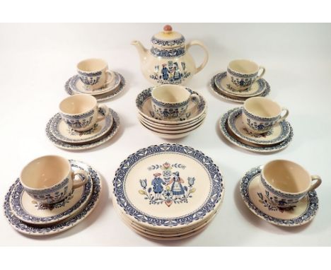 A Johnson Brothers 'Heart &amp; Flowers' breakfast set comprising teapot, seven cups and saucers, five bowls, five small plat