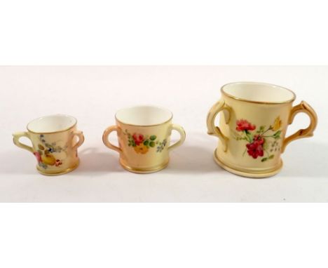 A Royal Worcester three handled miniature tyg painted flowers on an ivory blush ground and two smaller 6cm, 4cm and 3.5cm tal