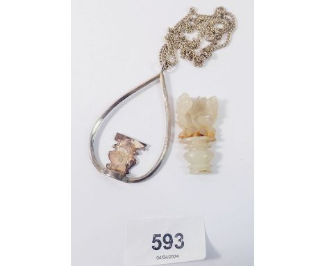 A Chinese silver and jade pendant, the jade a/f 