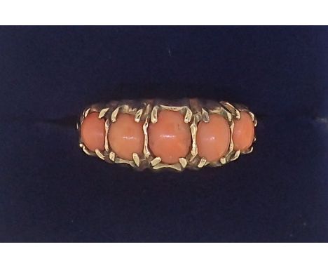 A Victorian 9 carat gold graduated coral set ring, size N, 1.8g 