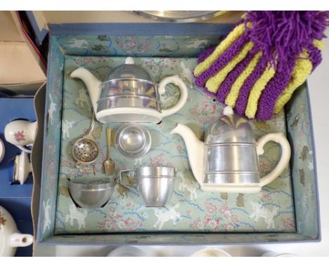 A vintage children's chrome clad pottery tea service, boxed, another part children's tea set, boxed and one not boxed plus a 