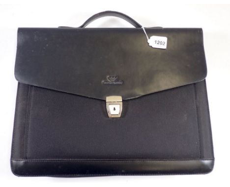 A Giorgio Armani briefcase plus an unused filofax style wallet 