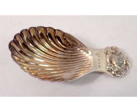 A silver caddy spoon with shell terminal, London 1966 by A Chick &amp; Sons Ltd. 20g 