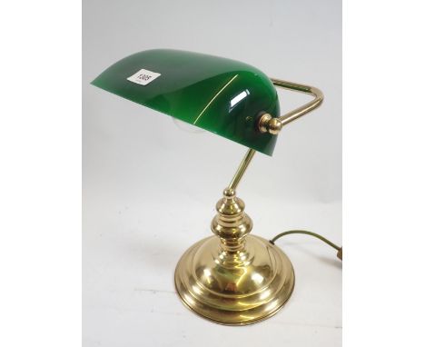 A brass desk lamp with green glass shade, 37cm tall 