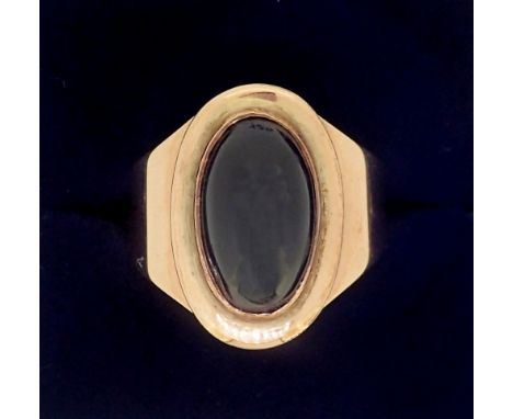 An early 19th century gold ring set cabochon oval cut stone, inscribed within 'Edw Hippsley Esq 06 18 Aug 1802' 5g, size R to