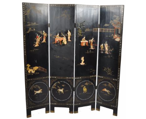 A quilty antique late 19th Century Japanese&nbsp;hardwood black lacquer and shibayama four-fold dressing / room dividing scre