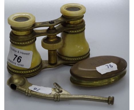 A Bosun's whistle, a snuff box and opera glasses.