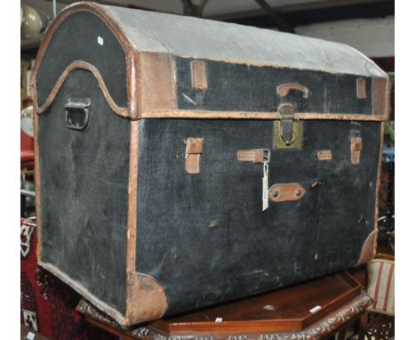 Vintage dome top leatherbound trunk