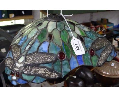 A small triangular Tiffany style lamp shade.
