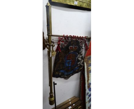 An Antique brass barometer and thermometer.