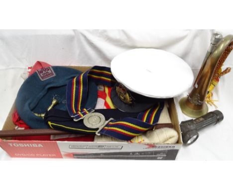 Military caps, torch, bugle, mouthpieces, Regimental belt, swagger stick, etc.