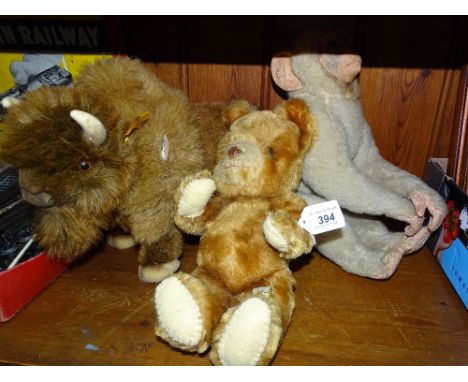 A Steiff bison, Dean's Rag Book monkey and teddy