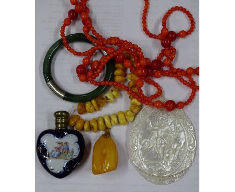 Blue ceramic heart shaped scent bottle, mother of pearl plaque, amber and bead jewellery, etc.