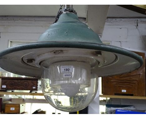 A green Urbis ceiling light.
