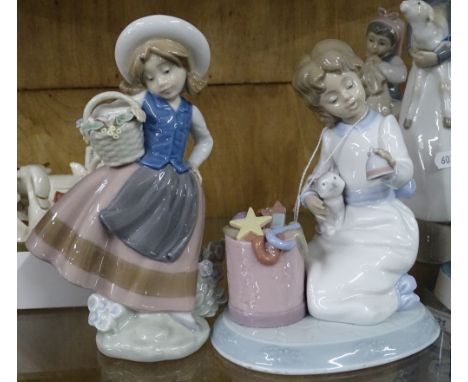 Lladro Christmas figure and a Lladro girl with basket.
