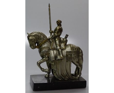 A Vintage metal table top knight figure table lighter.