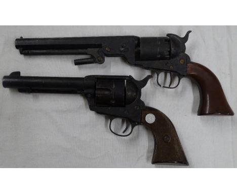 2 Vintage cap guns.