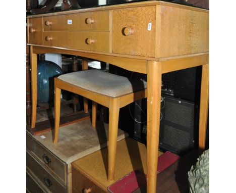 A mid century light oak dressing table with triple swing mirror and stool, by Vesper, bears label to the rear, width 108cm.