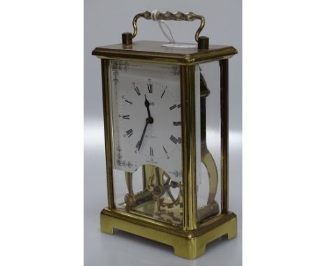 A German brass cased carriage clock.