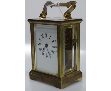 A brass cased carriage clock.