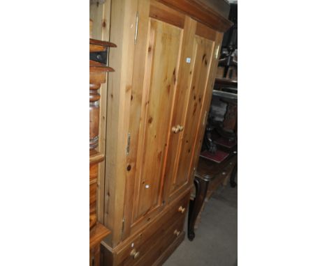 A modern polished pine 2-door wardrobe with drawer fitted base, width 96cm.