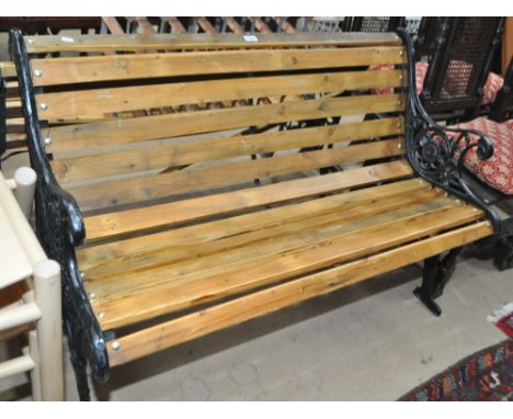 Slatted garden bench with cast iron ends, length 125cm
