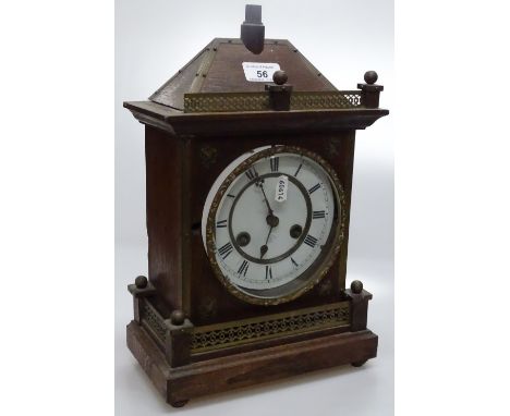 An oak cased 2-train mantel clock.