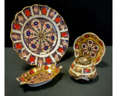 A Royal Crown Derby 1128 Imari wavy rim plate, 22cm diameter, 1993;  oval trinket dish, 1974 etc, all firsts (4) 