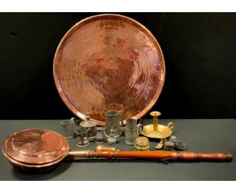 A 19th century copper Benares table top, central panel with six point star, banded filed, rolled lip, 67.5cm diameter;  19th 