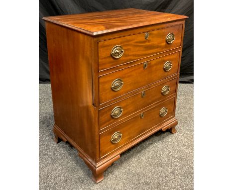 A George III style mahogany commode chest, four faux drawers to front, with hinged lift-up top, bracket feet, 81cm high x 69.