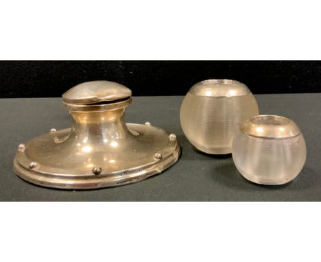 A George V silver inkwell, step beaded rim,  William Aitken, Birmingham 1919, two graduated silver topped match strikers (3) 