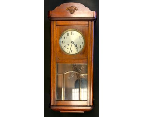 A 1930s oak cased wall clock, silvered dial, Arabic numerals, approx 8cm high 