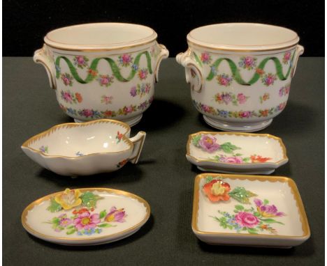 A pair of Dresden porcelain planters, decorated with Roses and Ribbon swags, moulded handles, printed marks, 10cm high, 14cm 