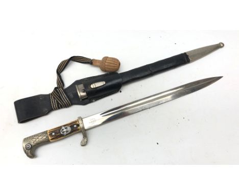 A WWII German Third Reich Police dress bayonet, 33cm fullered blade stamped Alexander Coppel Solingen, and scale Trade Mark, 