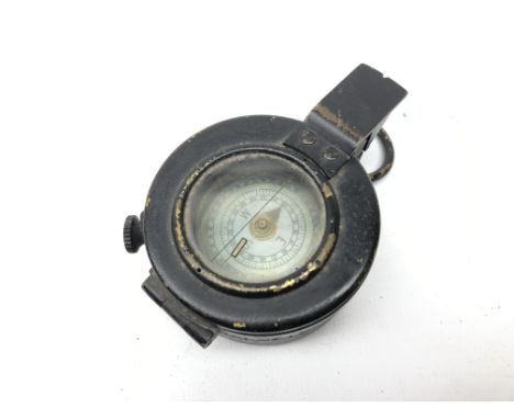 WWII Military compass in black japanned brass case, stamped on base EAC, No.B 133577, MkIII 1943, and broad arrow, W9.5cm Con