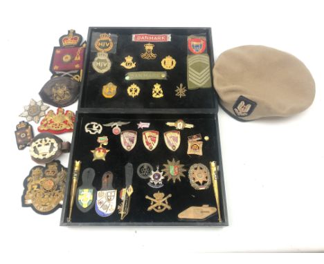Territorial SAS cap by Compton Webb, WO1 arm badge, and wrist band, WO2 (QMSI) wrist band, Irish Guards badges etc, etc, two 