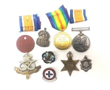 WW1 pair to 45154 Pte. T.Childs S.Staffs.R both with ribbons in packets of issue, South Staffs cap badge, an Atlantic Star, s