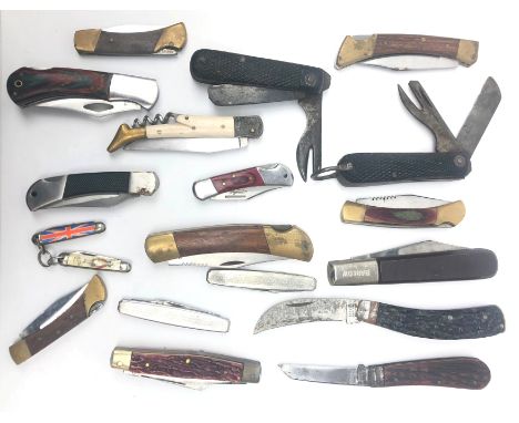 WW2 pocket knife, stamped 1944 broad arrow DCC Sheffield, another broad arrow 1942 Wilson, both with textured grips, a George
