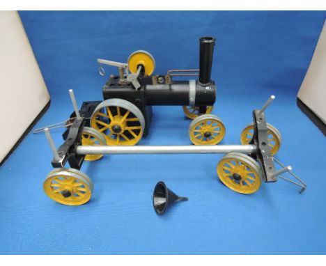 A Mamod live stream traction engine and log trailer