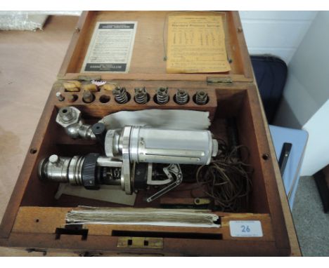 An early 20th century Dobbie McInnes Ltd, Glasgow steam engine indicator in wooden box with pressure springs etc