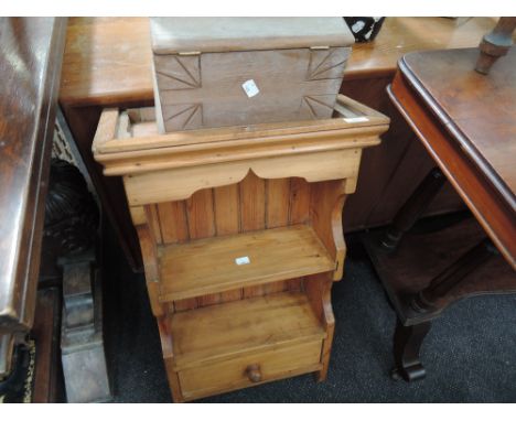 A pine wall shelf and free standing pine cabinet