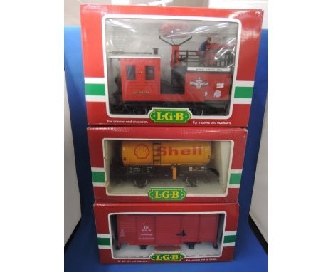 Three LGB G scale items of rolling stock, freight van 46355, shell tanker 4040s, fire wagon 41490 all boxed