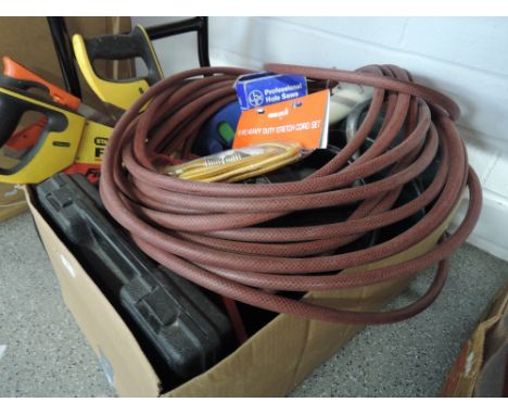 A box of tools including saws etc