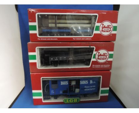 Three LGB G scale items of rolling stock, pipe trailer 41500, pipe trailer 40230, freight van 4029 all boxed