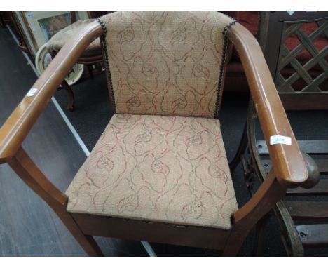 A mid 20th century commode chair