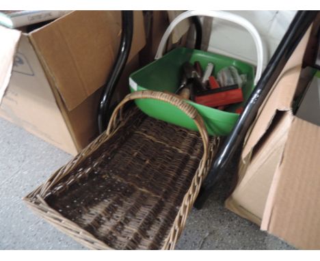 Two garden truggs, one containing garden tools