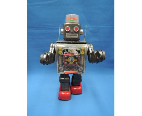 A 1960's Japanese tinplate and battery operated robot
