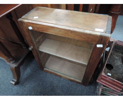 A vintage pine cabinet