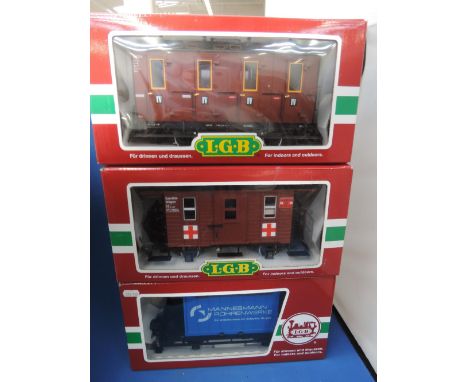 Three LGB G scale items of rolling stock, hospital car 41390, container wagon 45030, and compartment coach 30504 all boxed